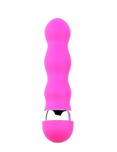 En  en mini vibromasseur rose avec une forme ondulée pour des plaisir plus intenses.