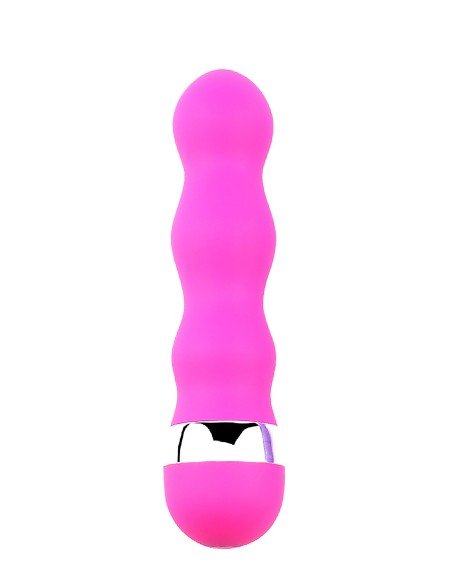 En  en mini vibromasseur rose avec une forme ondulée pour des plaisir plus intenses.